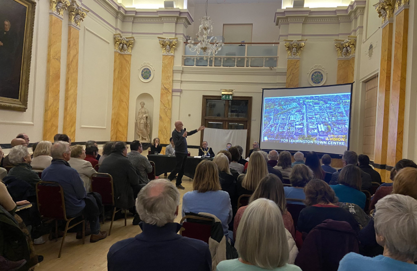 Attendees listen at the Town Assembly